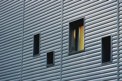 Improve Energy Efficiency with Metal Siding Repair!